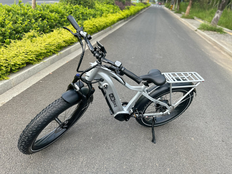 How does 750W assistance help on hills?